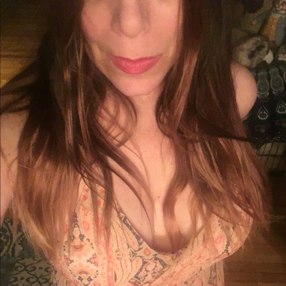 Cascading dress flowery pastel palate.